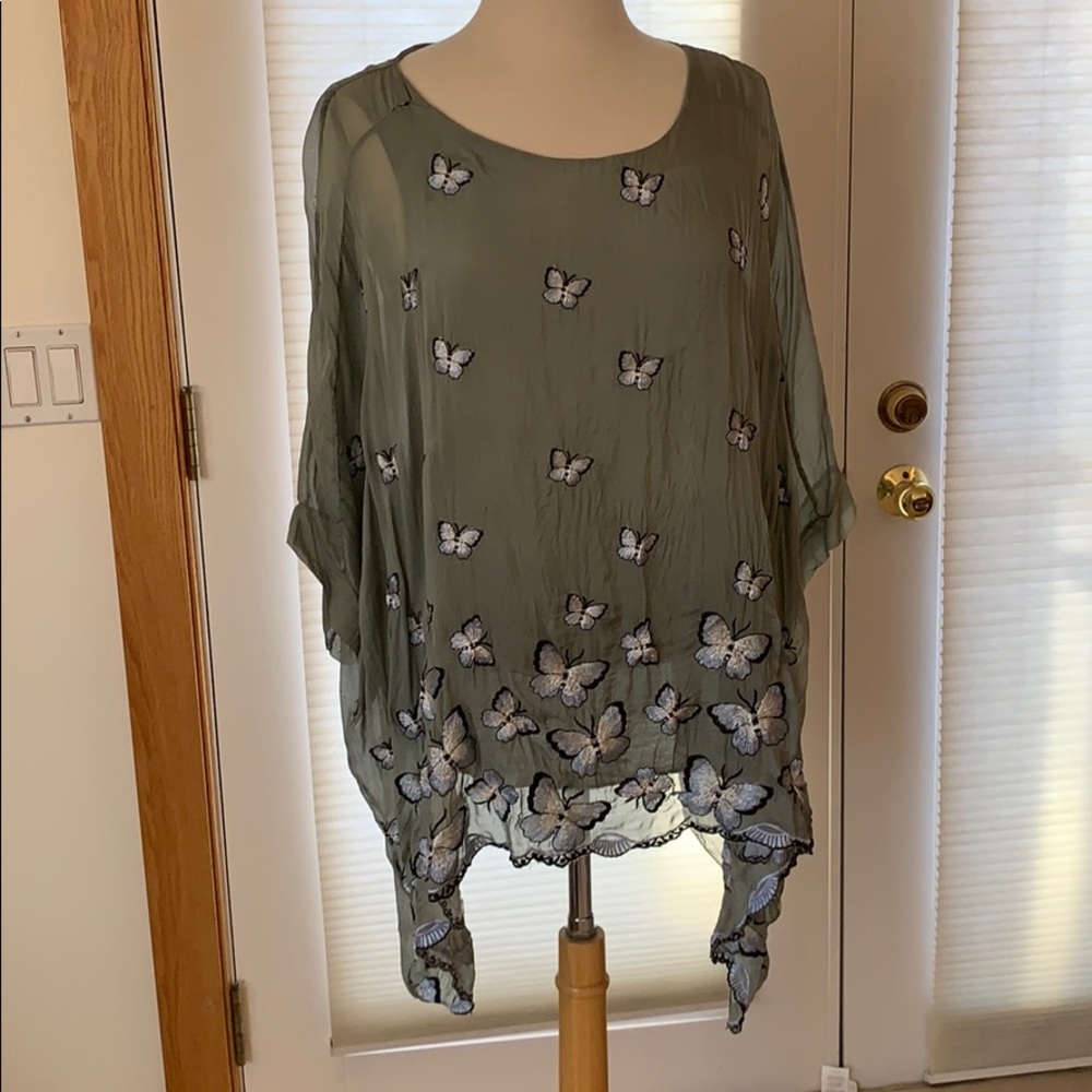 Embroidered butterfly floaty top.